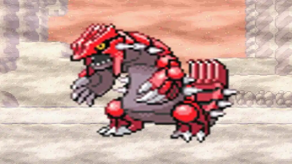 Pixel art Groudon standing in a rocky cave with red armor plates, sharp claws, and glowing yellow eye