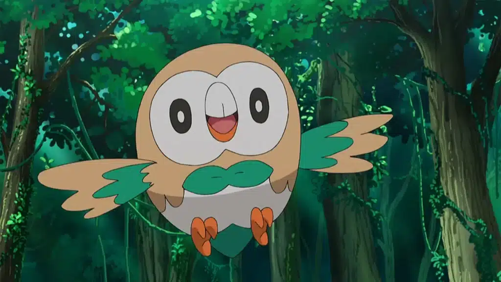 Rowlet hovering with wings spread and a cheerful face, set against a lush green forest background