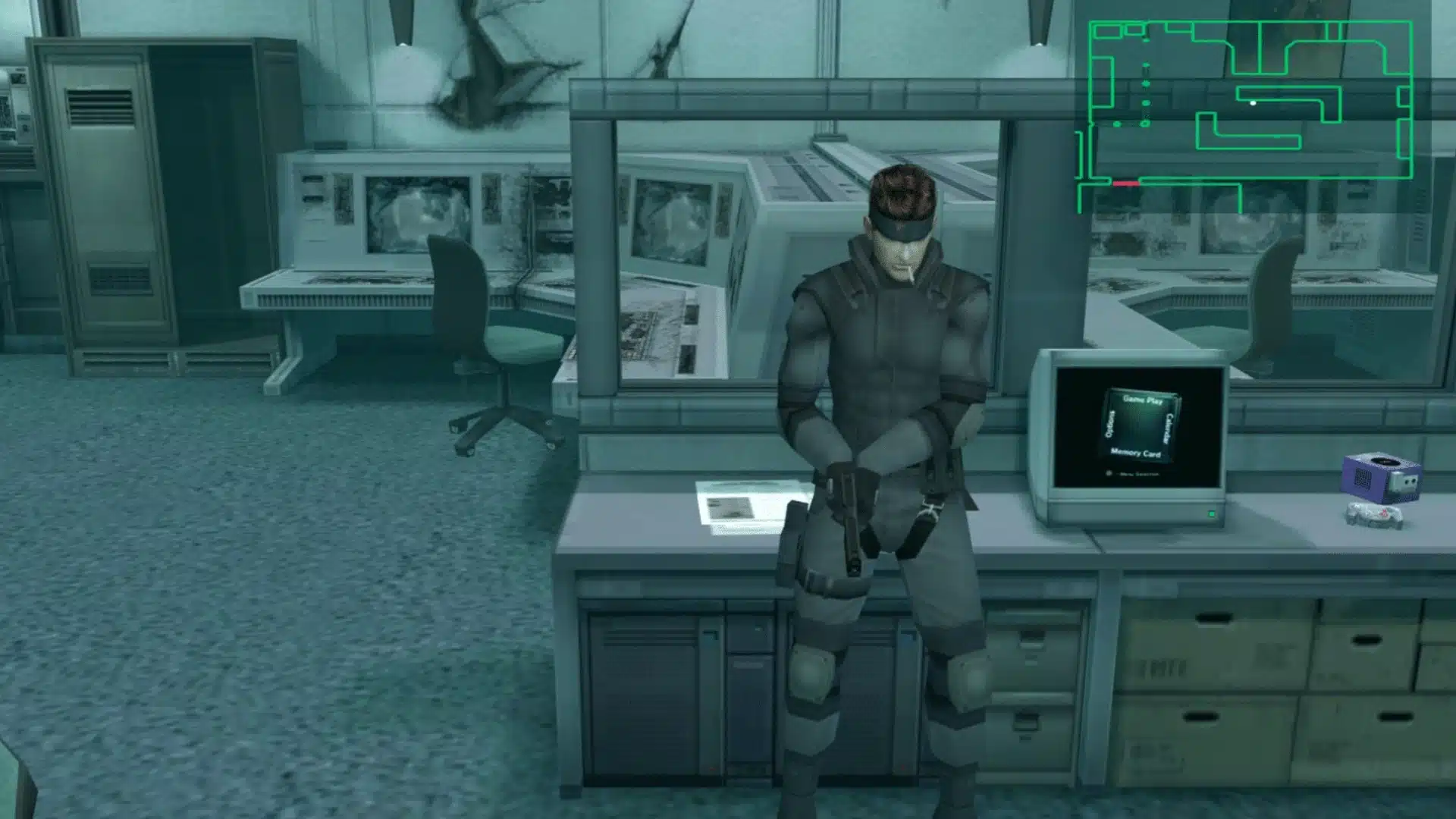 Metal Gear Solid The Twin Snakes scene with Solid Snake holding a gun in a control room, radar map visible, via GamingBolt