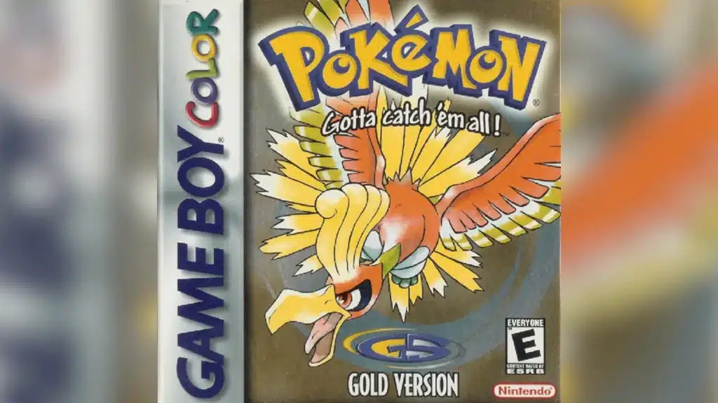 Pokemon Gold Version Game Boy Color box art featuring Ho-Oh flying with wings spread, golden background swirl, Pokemon logo and Gotta catch em all slogan above