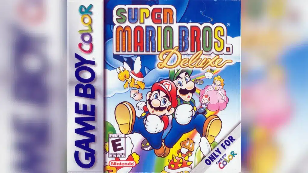 Super Mario Bros Deluxe Game Boy Color box art featuring Mario running with Peach Toad and enemies in colorful side scrolling world with logo
